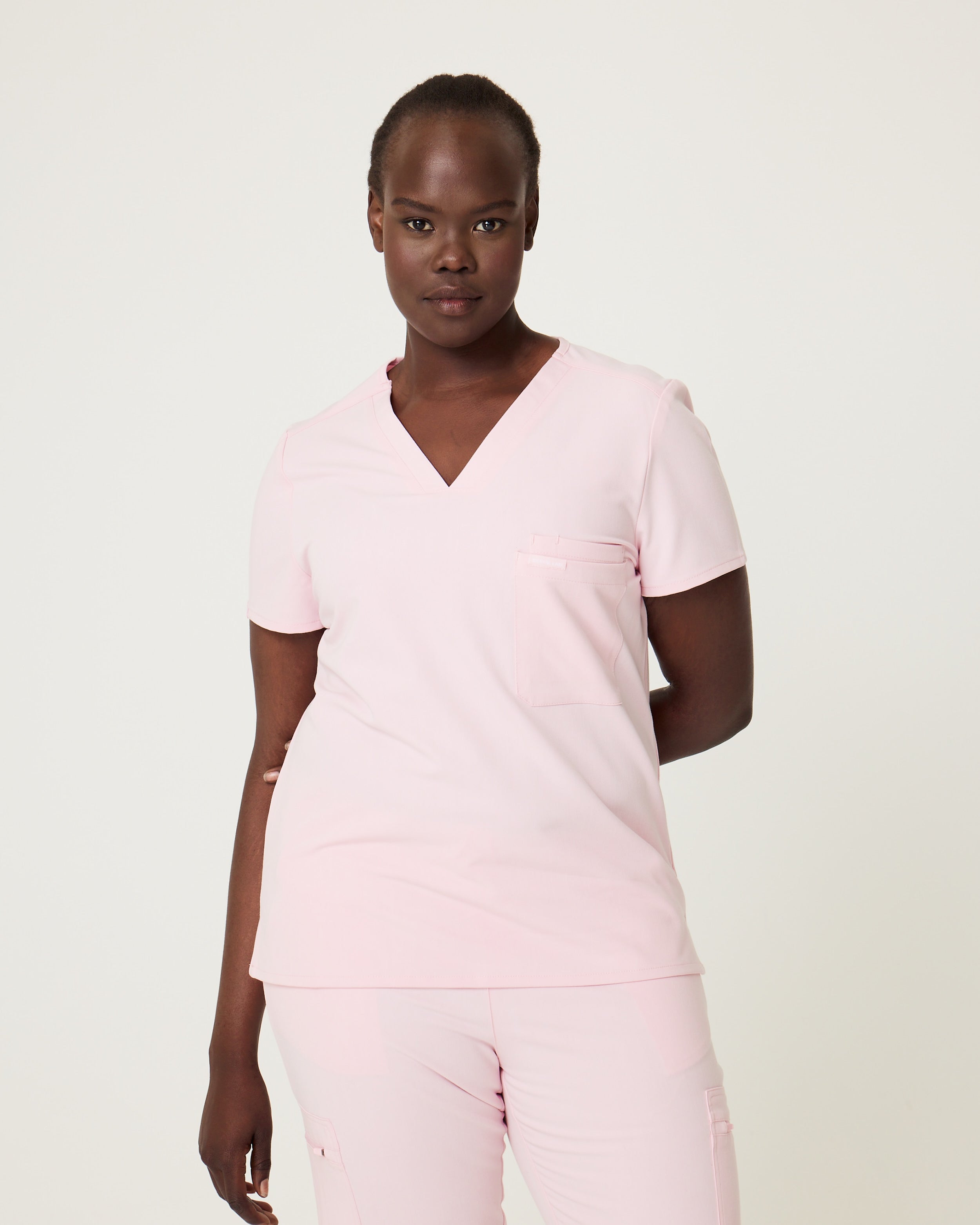 pink women's scrub top