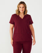 maroon women's scrub top