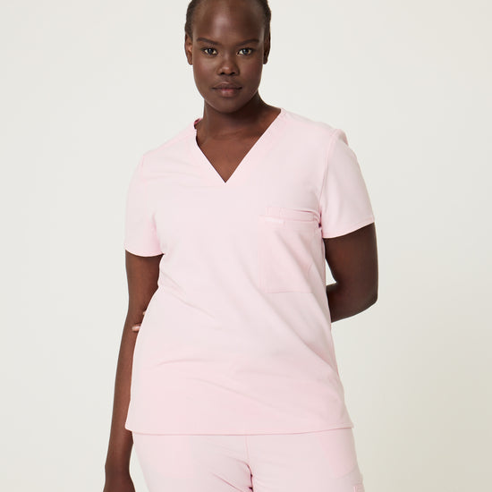 pink women's scrub top